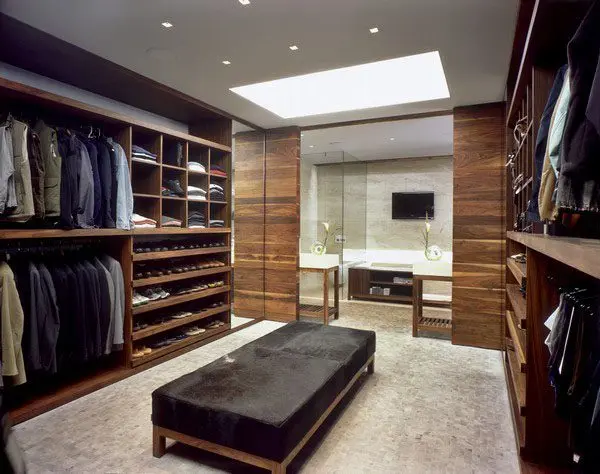 Modern walk-in closet with seating